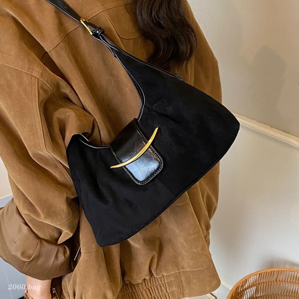 Outono inverno venda quente camurça axilas saco 2025 All-match elegante requintado nicho Design feminino Commuter ombro