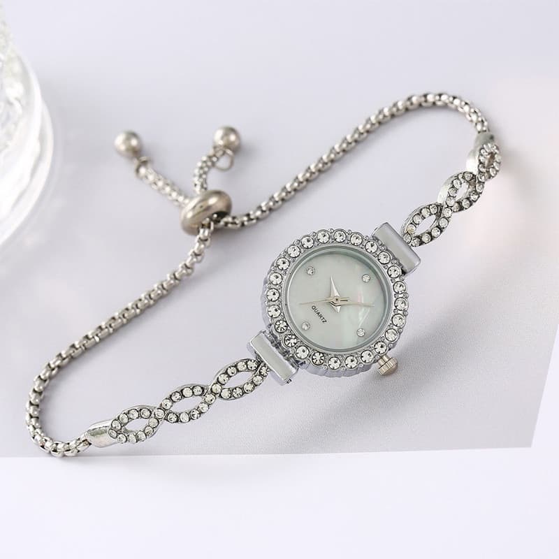 Liquidação de Armazém: Relógio Feminino de Moda com Pulseira de 8 Olhos/Corrente BNL4