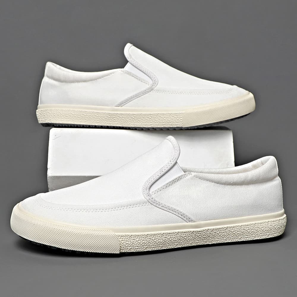 2026 primavera novo estilo versão coreana na moda esportes respirável sapatos de lona branca masculino deslizamento-On A