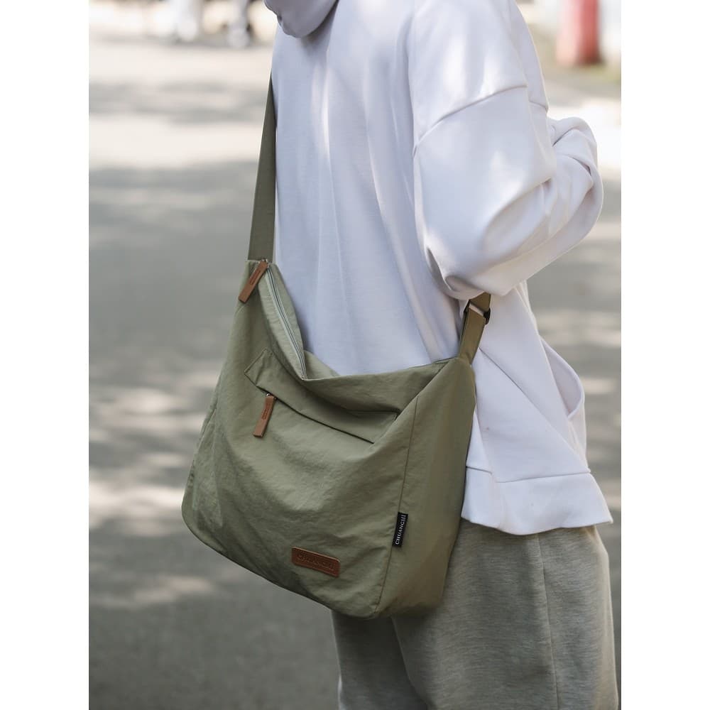 Bolsa mensageiro masculina ins na moda japonês simples grande capacidade mochila masculina casal bolsa de ombro feminino