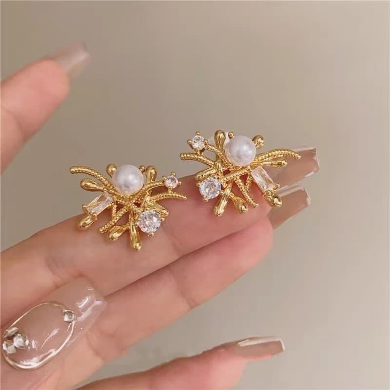 Floco de neve High-End estilo metálico brincos feminino luz estilo luxo Design Irregular sentimento fogos de artifício b