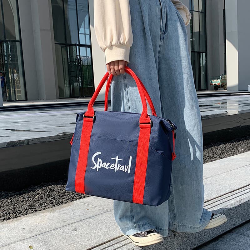 Bolsa de viagem de curta distância feminina portátil de grande capacidade à prova d'água bolsa de bagagem bolsa de ginás
