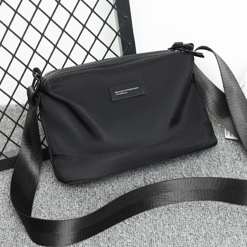 Novo estilo bolsa mensageiro masculina bolsa de ombro mochila masculina High-End Casual lona grande capacidade Commuter