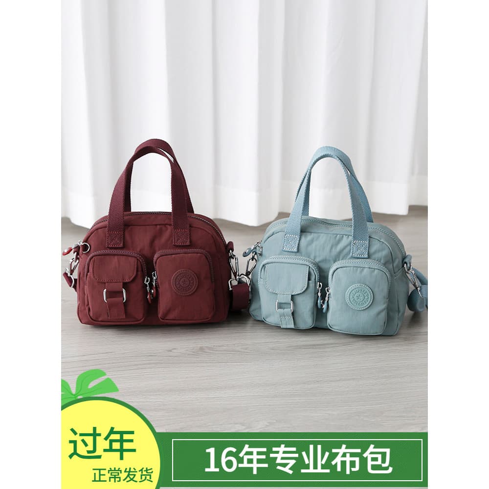 2026 novo estilo à prova dwaterproof água bolsa feminina portátil saco do mensageiro pequena moda All-Match saco de pano