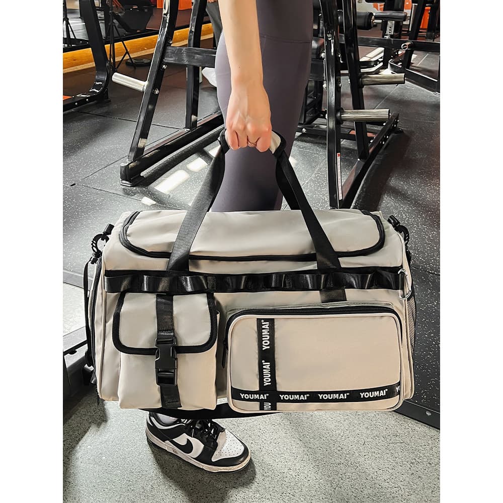 Bolsa de viagem de curta distância 2024 Novo estilo masculino portátil de grande capacidade bolsa de bagagem feminina vi