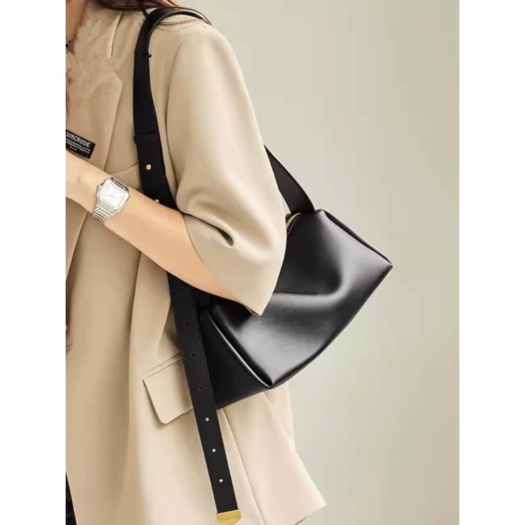 Bolsa feminina mensageiro 2026 novo estilo moda simples axilas saco Baguette preto bolsa de ombro saco macio feminino