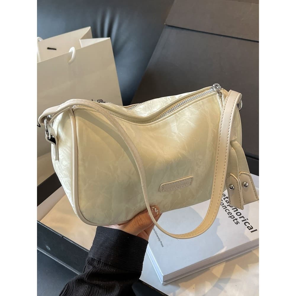 Simples Casual nicho bege textura pequena bolsa mensageiro 2024 novo estilo moda na moda All-Match travesseiro saco