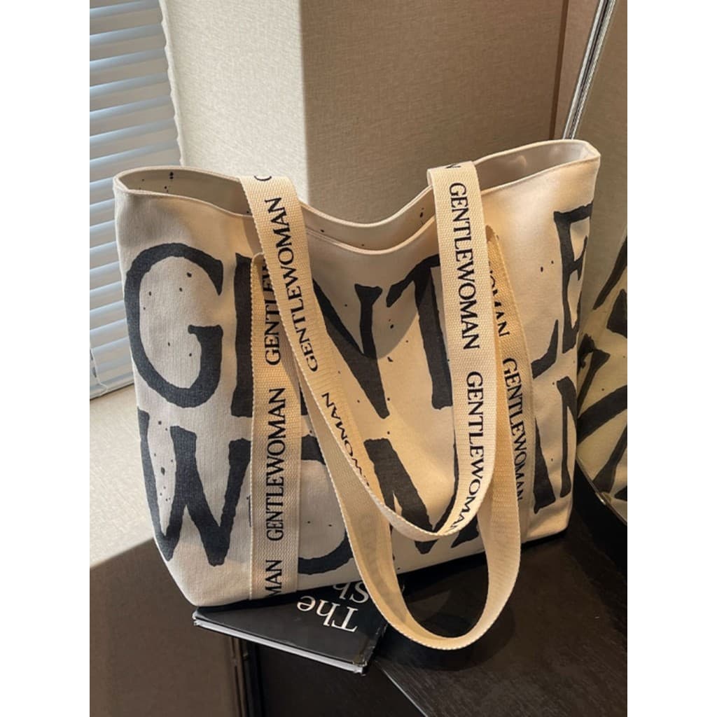 Bolsa de lona com letras de nicho tailandês feminina 2025 novo estilo Casual bolsa de viagem de grande capacidade classe