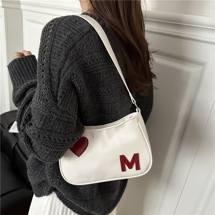 Bolsa feminina bolsa de axilas 2025 outono inverno bolsa de ombro pequena Design feminino nicho ins bolsa de ombro peque