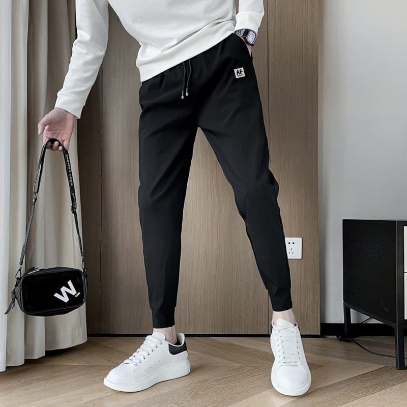 Calças bonitas masculinas versão coreana na moda tornozelo comprimento calças casuais 2026 novo estilo primavera outono