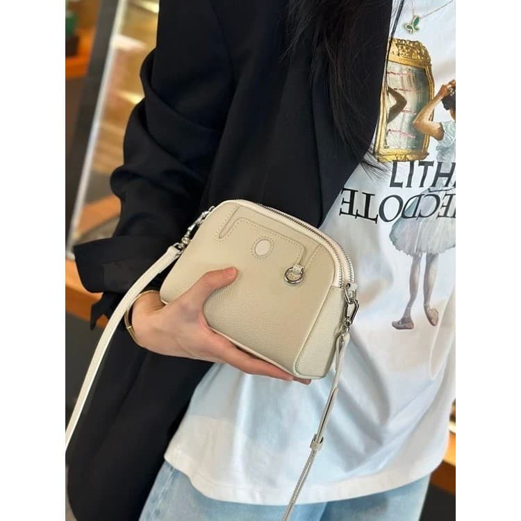 Bolsa pequena de couro genuíno feminina 2026 novo estilo bolsa para celular feminina bolsa mãe All-Match bolsa mensageir