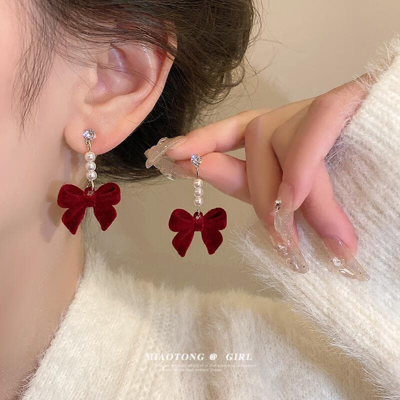 Agulha de prata outono inverno brincos de veludo vermelho feminino pérola arco brincos nicho Design High-End All-Match b