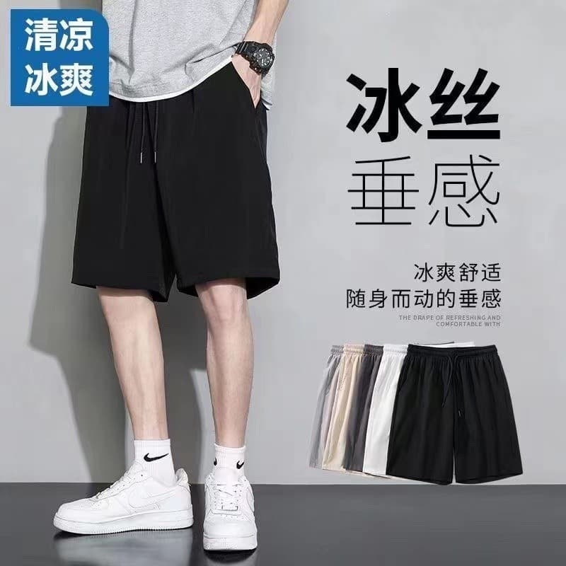 Shorts curtos masculinos verão 2024 novo estilo de seda gelo de secagem rápida calças de cinco pontos ins masculino Casu