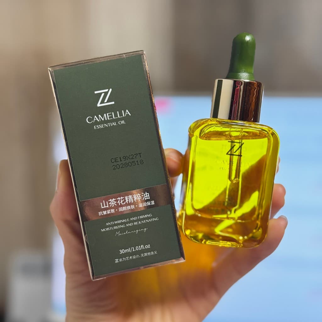 Com óleo essencial nutritivo para a pele!Óleo de essência de camélia 30ml óleo de cuidados com a pele facial firmador An