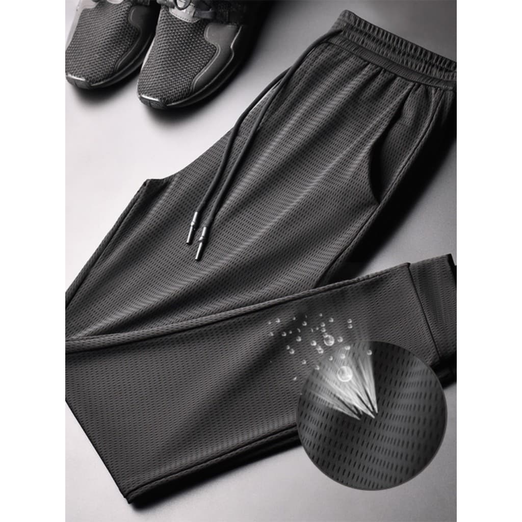 Calças de malha de seda gelo masculinas verão Ultra-fino ventilação buracos de secagem rápida calças esportivas masculin