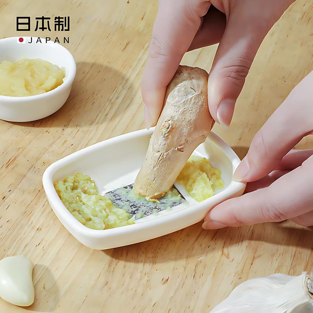 Japão importado alho ferramenta útil Manual triturador de alho doméstico moedor de alho cozinha moagem gengibre suco tri