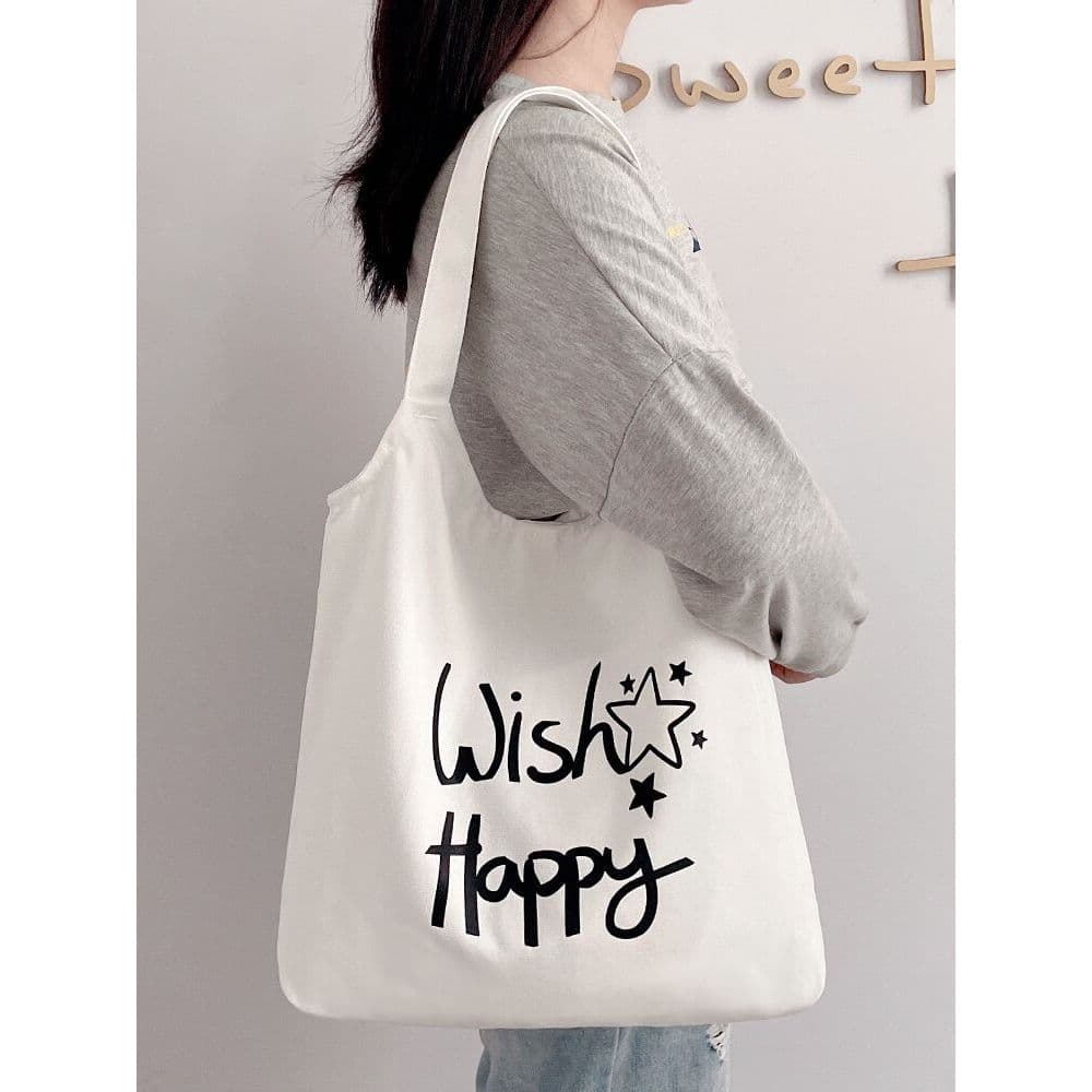 Bolsa de lona feminina 2026 novo estilo bolsa de ombro portátil bolsa de pano estudante classe livro grande capacidade t