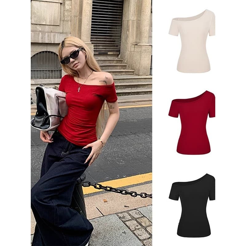 Americano quente menina Design nicho chique ombro inclinado manga curta camiseta feminina verão chique magro-ajuste mais