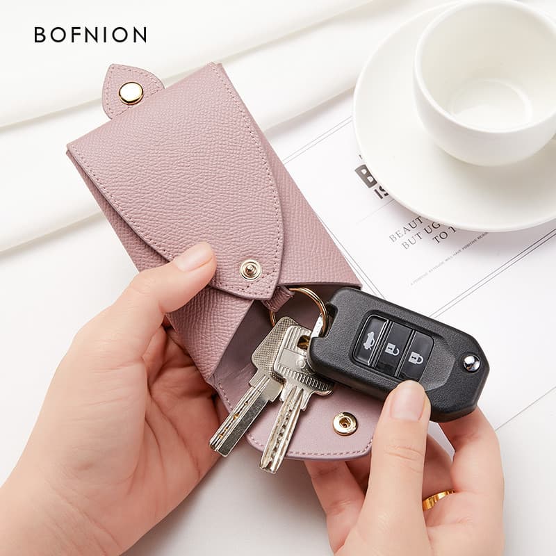Bolsa de chave Pull-out feminina pequena simples moda capa de chave de couro genuíno bolsa de chave de carro exclusiva b