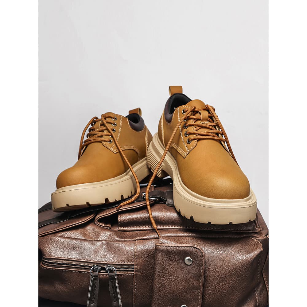 Sanzan macacão sapatos masculinos de couro genuíno de sola grossa Martin botas de cano baixo 2026 novos sapatos de couro