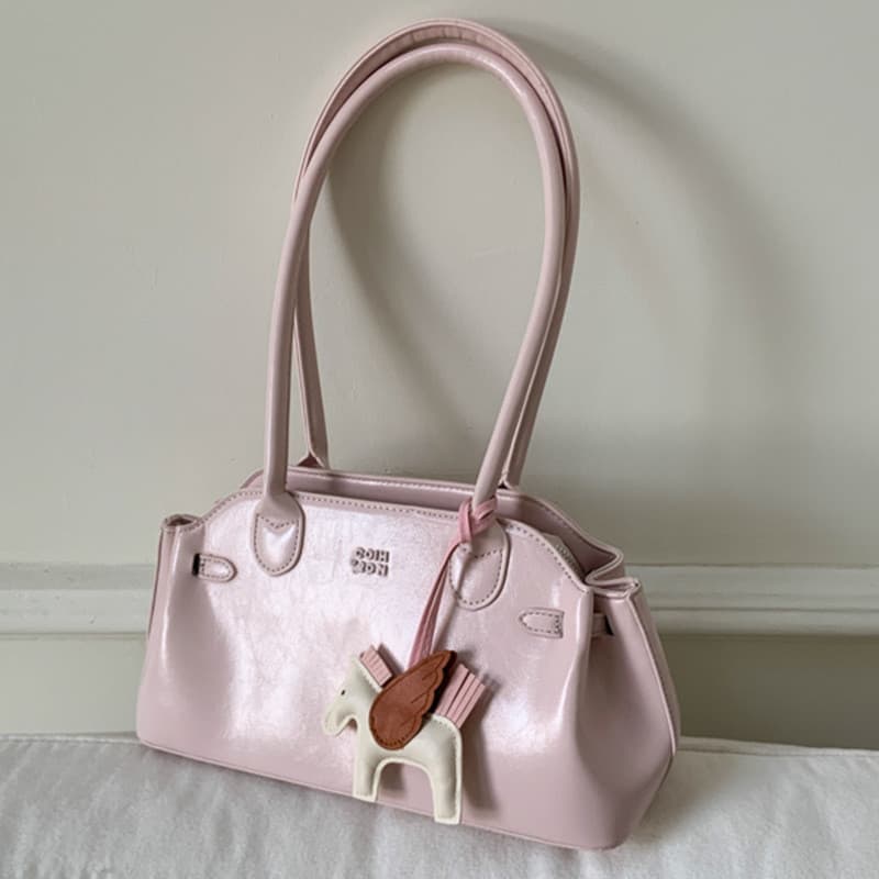 Nova bolsa de boliche nas axilas