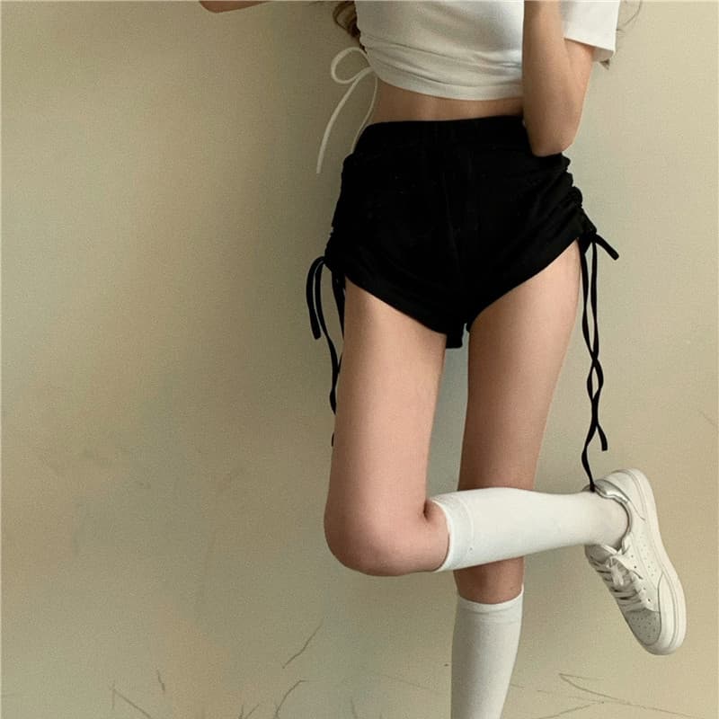 Menina quente Super Shorts feminino verão Design fino nicho cordão amarrado magro calças quentes preto Casual calças esp