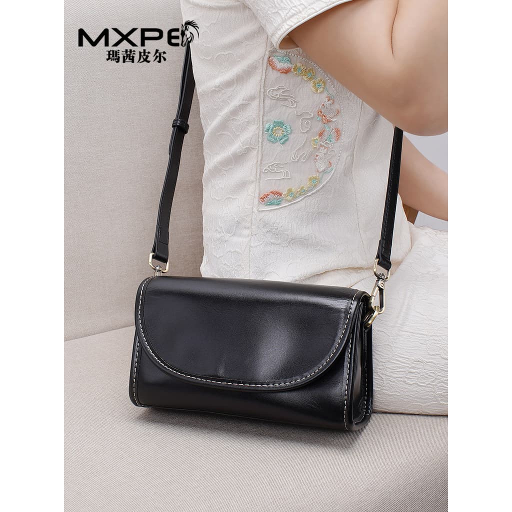 Bolsa feminina 2026 novo estilo de couro genuíno bolsa feminina moda All-Match nicho Design High-End textura primeira ca