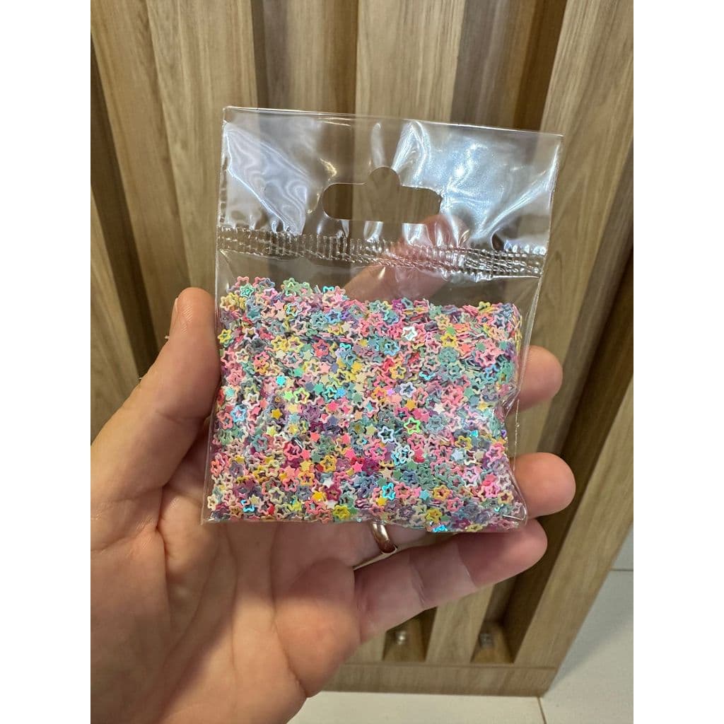 Aplique confete Paetê estrelas vazadas multicor 20g