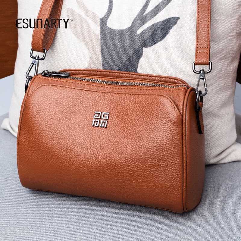 Bolsa mensageiro feminina 2025 novo estilo moda couro genuíno ombro axilas bolsa feminina All-Match textura couro macio