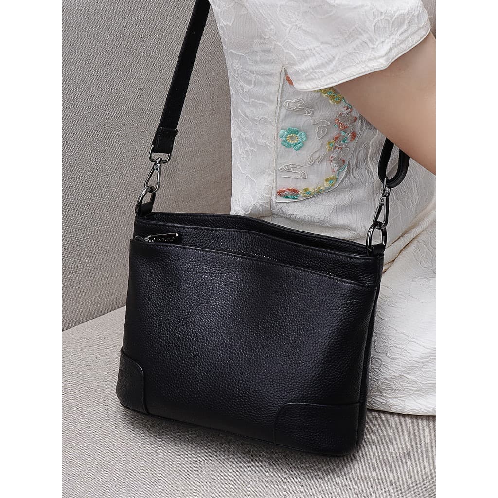 Bolsa balde de couro genuíno feminina 2026 novo estilo outono moda grande capacidade primeira camada de couro Cross-corp