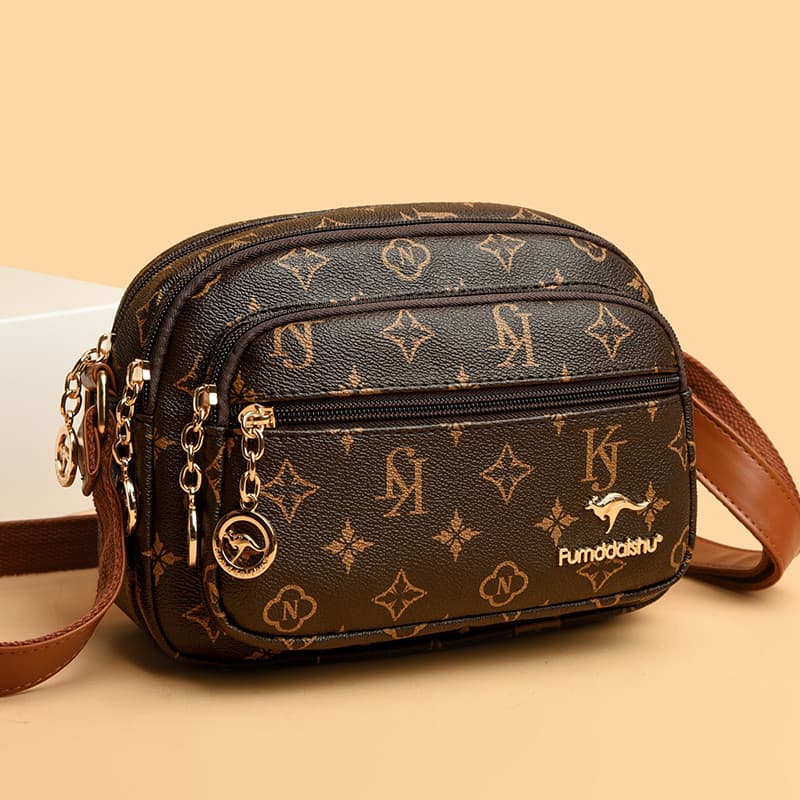 Bolsa feminina de ombro de couro genuíno genuíno 2026 Novo estilo moderno de grande capacidade Bolsa mensageiro de couro