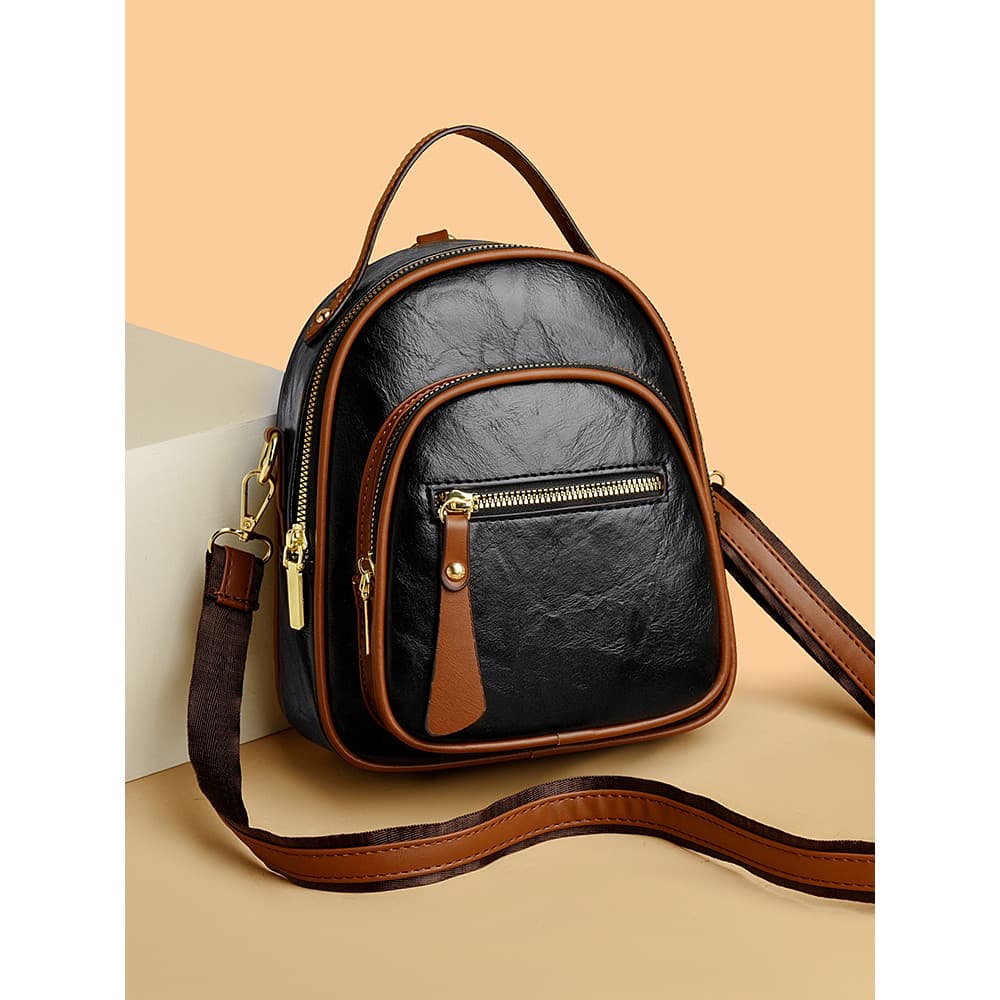 Mochila de couro genuíno pequena bolsa de ombro feminina 2025 novo Retro Casual pequena mochila multifuncional saco do m