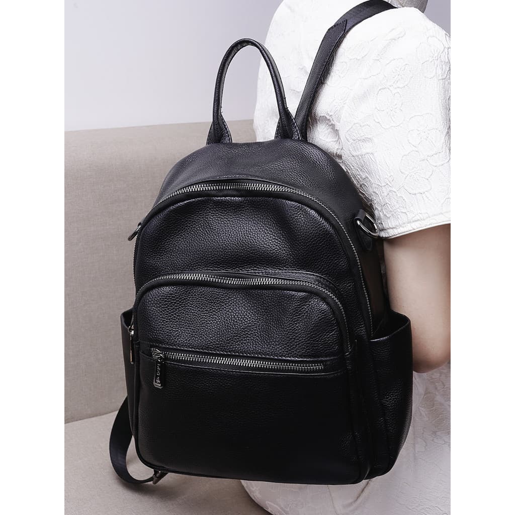 Mochila feminina 2026 novo estilo versão coreana couro puro mochila grande capacidade couro macio moda feminina mochila
