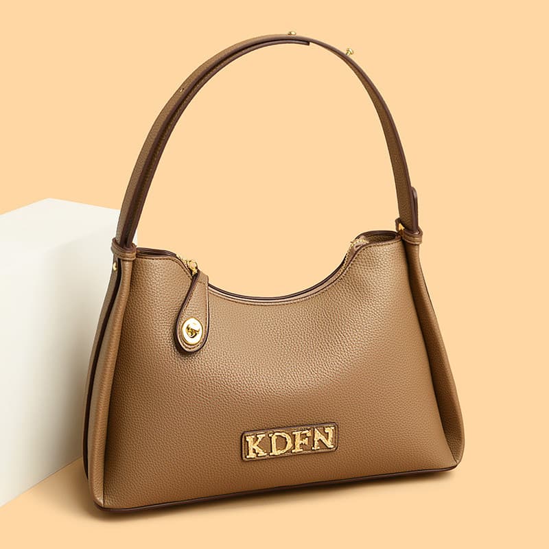 Bolsa de couro genuíno nas axilas 2026 Novo estilo elegante All-Match bolsa mensageiro de um ombro de grande capacidade