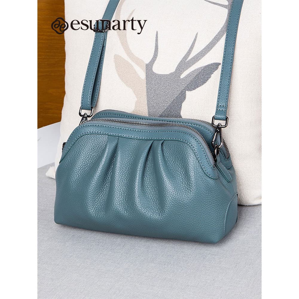 Bolsa mensageiro feminina de couro genuíno 2026 novo estilo High-End sentir grande capacidade pequena bolsa redonda cour