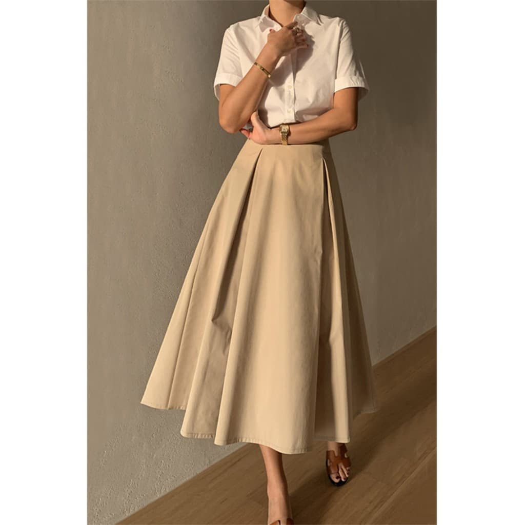 Saia feminina High-End verão novo estilo grande bainha guarda-chuva saia Design Casual Commuter comprimento médio a linh