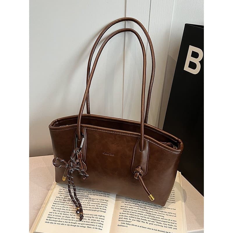 Textura de alta qualidade Retro bolsa de grande capacidade senhoras 2025 temporada Commuter bolsa de ombro portátil saco