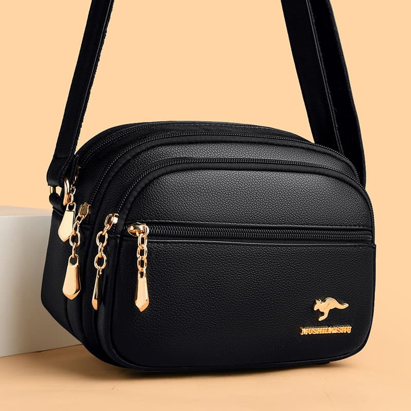 Bolsa feminina de couro genuíno genuíno, bolsa mãe de meia-idade 2026 novo estilo de couro macio bolsa mensageiro de omb