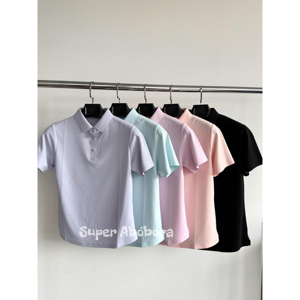Camisa polo feminina de manga curta, em tecido de seda gelada com elástico