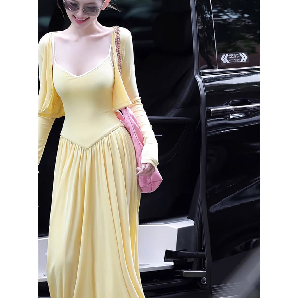 2026 novo estilo primavera rico casa filha bonito gigante bonito High-End amarelo Cardigan estilingue vestido conjunto d