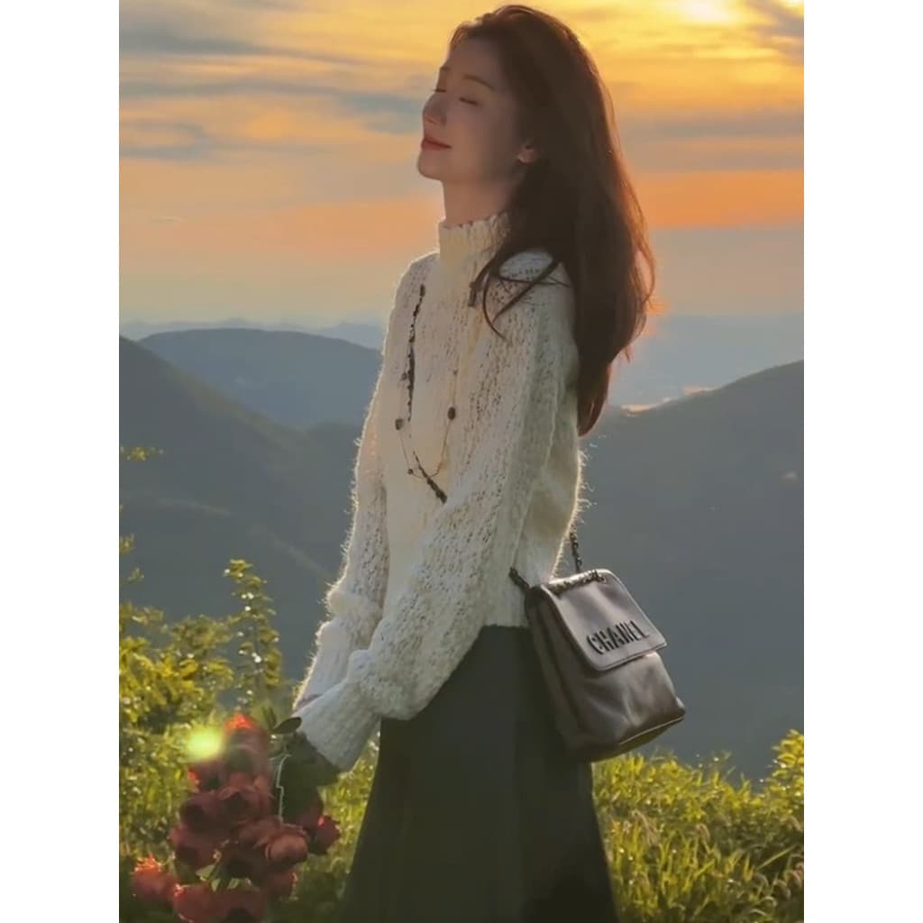 G Conjunto de um início da primavera 2026 Super quente coreano chique High-End branco suéter saia conjunto de duas peças