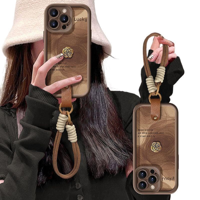 Capa de telefone camélia marrom de couro outono inverno adequada para iPhone 17/16/15 Pro Max/14/13pro/12/11/X/XS/8/7/co