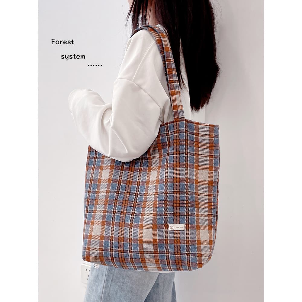 Bolsa de lona feminina de grande capacidade xadrez bolsa de ombro 2026 novo estilo de lã preguiçoso estudante bolsa Comm