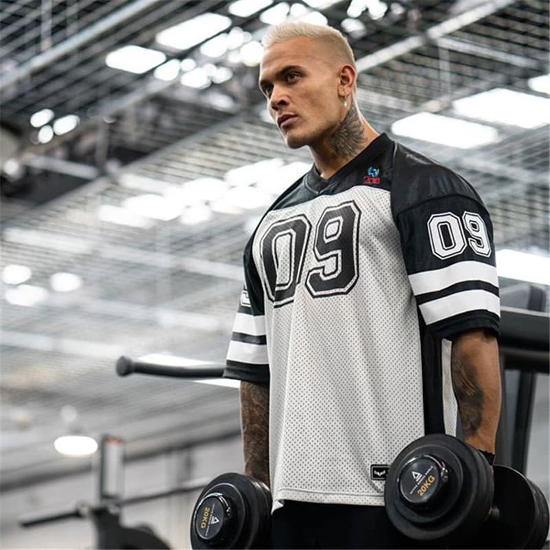 Muscle Fitness solto tamanho grande esportes camiseta masculino futebol basquete treinamento de secagem rápida manga cur