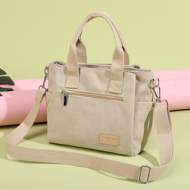 Bolsa de lona de grande capacidade feminina 2024 novo estilo bolsa mensageiro elegante All-Match Commuter sacola classe