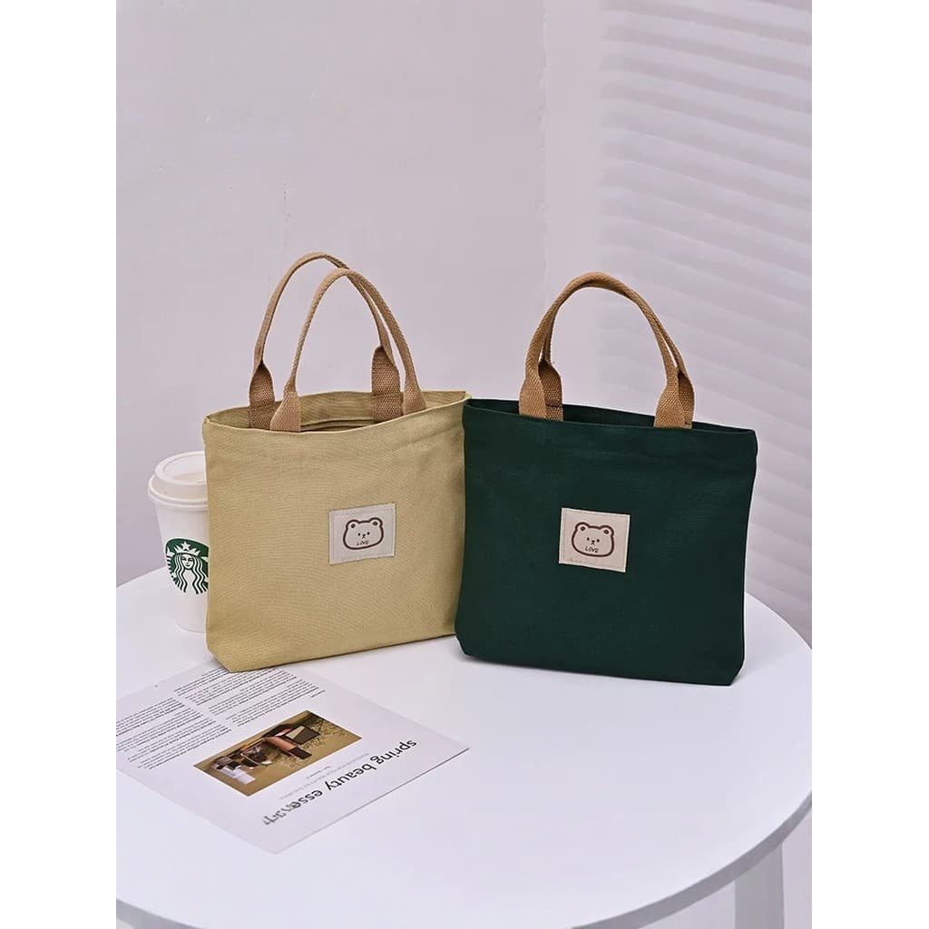 Bolsa de lona feminina 2026 novo estilo moda escritório trabalhador bolsa almoço japonês pequena bolsa de grande capacid