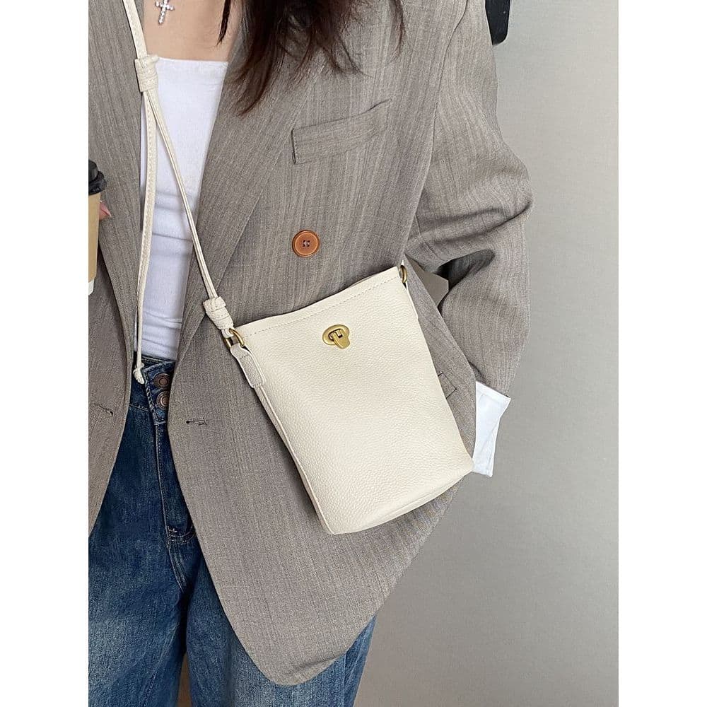 Bolsa para celular 2025 novo estilo de couro genuíno bolsa feminina bolsa mensageiro leve Mini bolsa pequena bolsa balde
