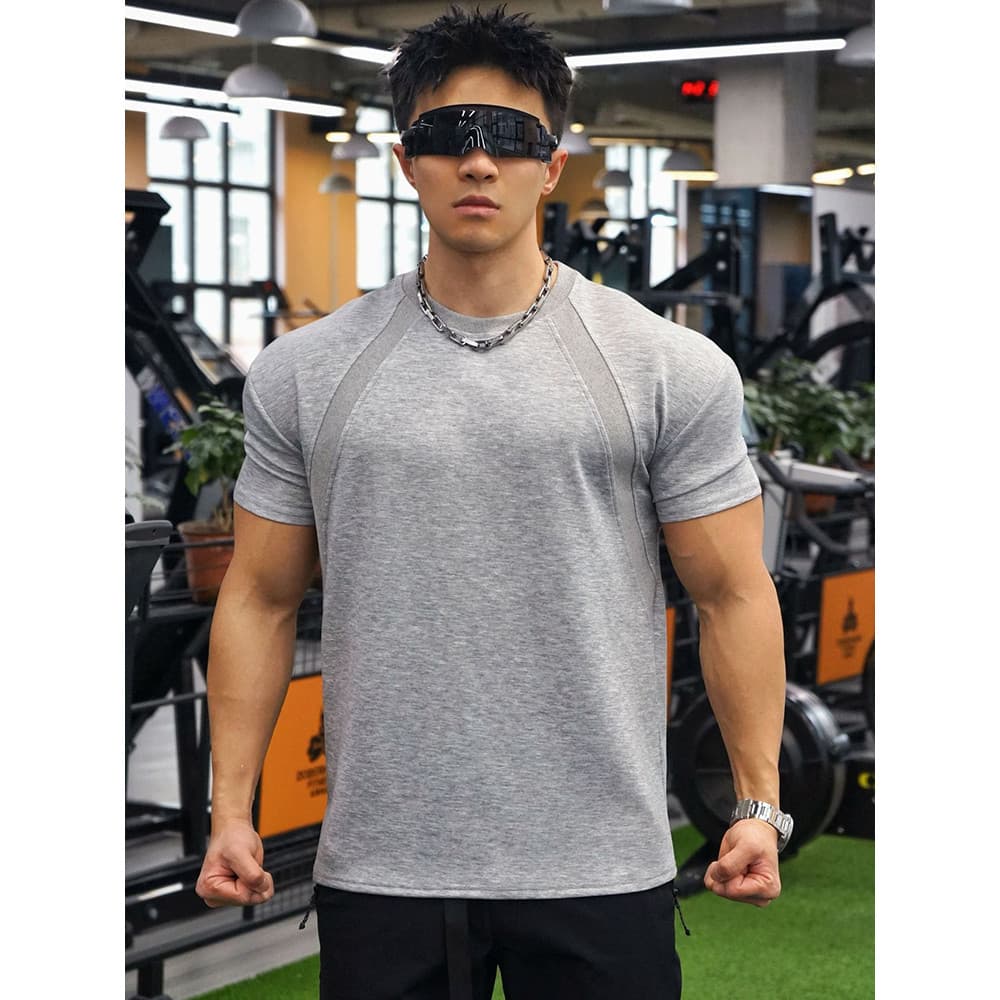 Esportes americanos de manga curta homens mostrar músculos soltos Casual topo correndo treinamento camiseta punhos roupa