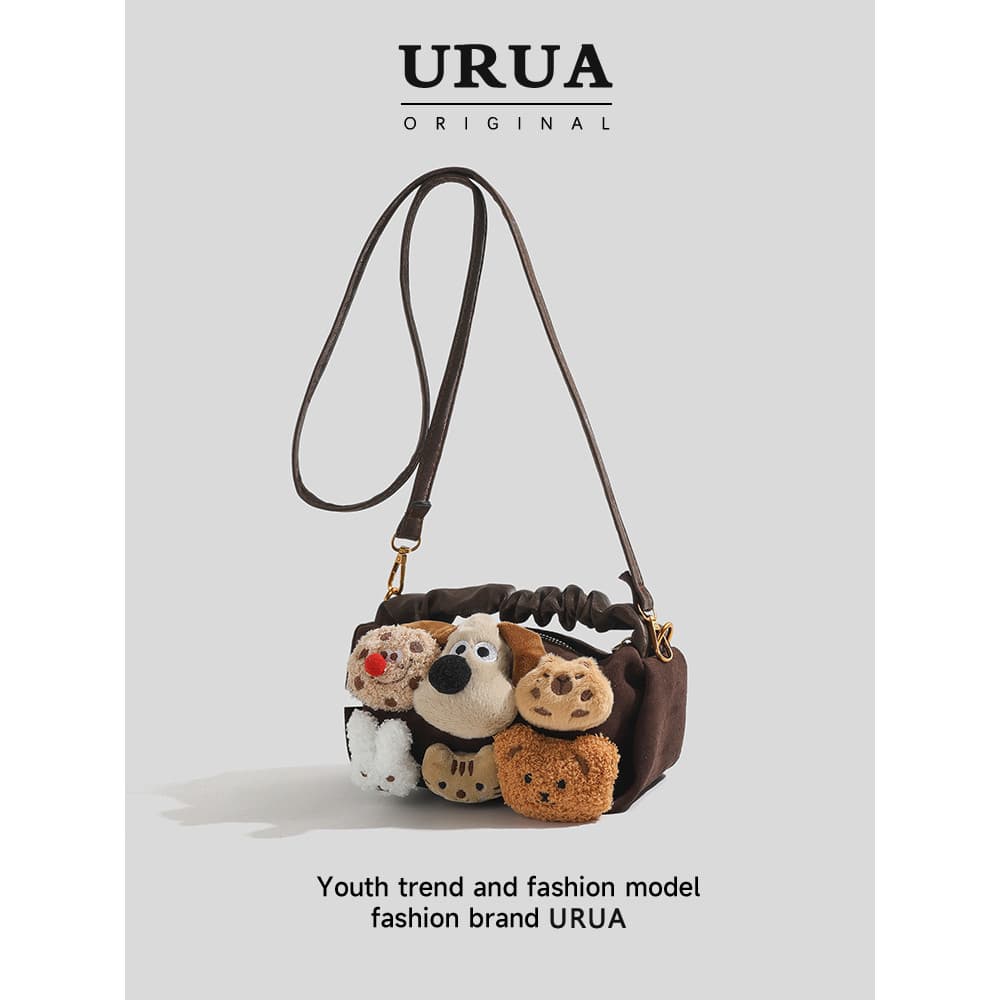 Versão coreana pequena bolsa mensageiro Design sentido nicho boneca bolsa pequena bolsa bonito menina outono inverno