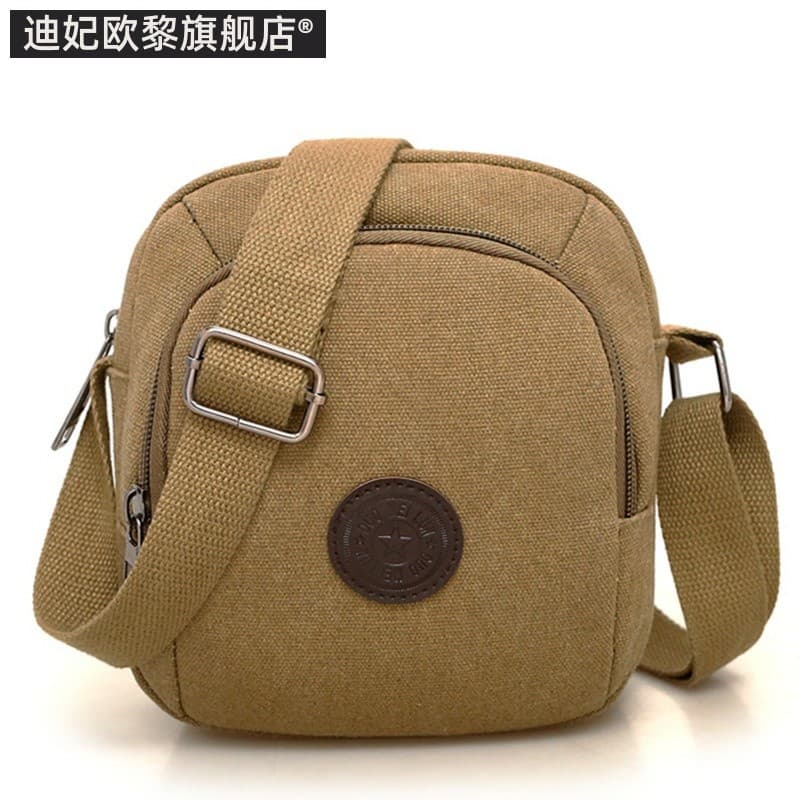 Nova cruz-corpo de um ombro Mini mochila masculina simples Casual japonês coreano saco de lona mudança do telefone móvel